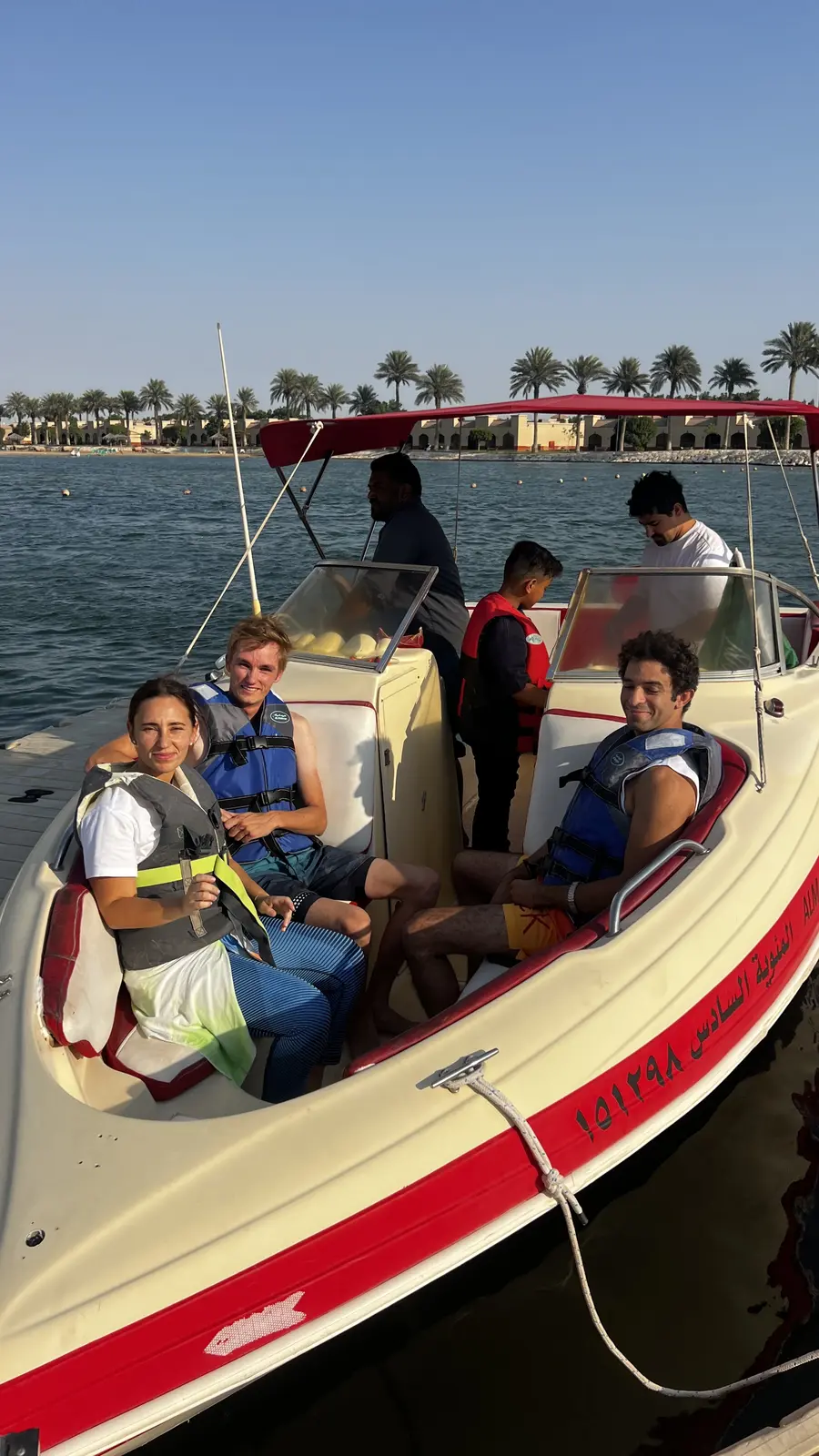 Group enjoying a relaxing boat trip at Half Moon Bay