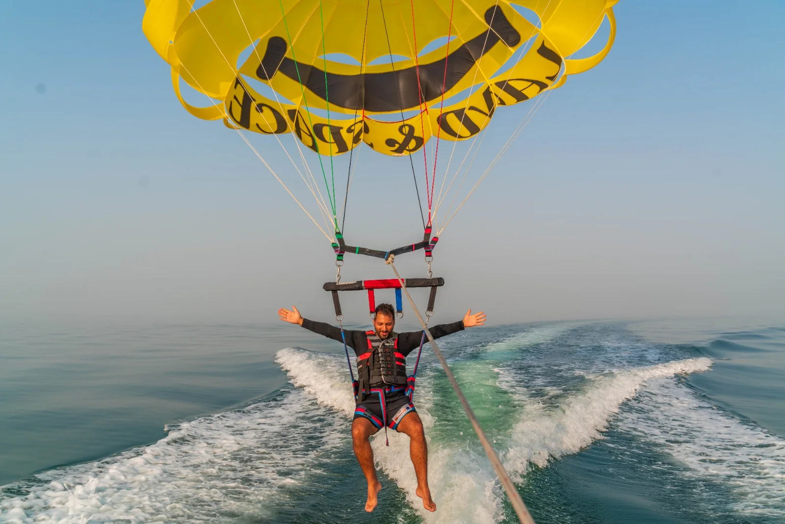 Parasailing over Half Moon Bay near Khobar
